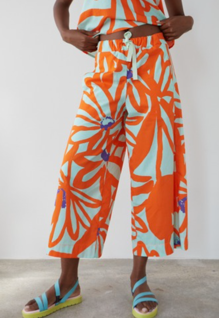 Hose mit weitem Bein mit Blumenprint orange/türkis - DRBLOOM
